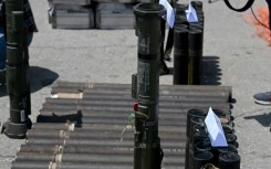 An AT4 anti-tank rocket launcher is displayed by authorities