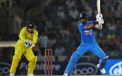 India captain KL Rahul on his way to an unbeaten 58 as Australian keeper Josh Inglis reacts