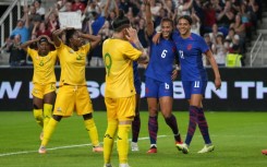 Lynn Williams (6) celebrates scoring in the USA's 3-0 win over South Africa