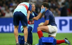 France captain Antoine Dupont had to leave the field after a clash of heads during France's rout of Namibia