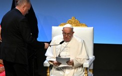 The pope's remarks were given in front of President Emmanuel Macron