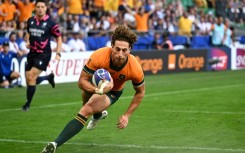 Wing Mark Nawaqanitawase scored Australia's first try against Fiji after taking a quick line-out