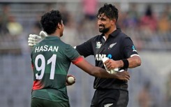 No hard feelings: New Zealand's Ish Sodhi (right) embraces Bangladesh's Hasan Mahmud after the bowler had performed a 'Mankad' dismissal