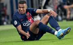 Kylian Mbappe came off in the first half after appearing to hurt his left ankle