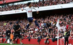 Tottenham's Son Heung-min celebrates scoring against Arsenal