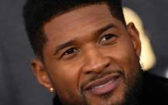 Usher, shown here at the Grammys in 2020, will helm the 2024 Super Bowl halftime show