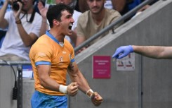 Full-back Baltazar Amaya celebrates after scoring his second try as Uruguay denied Namibia a first ever World Cup win in 26 attempts