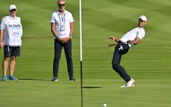 Novak Djokovic (R) enjoyed seven holes on the Ryder Cup course
