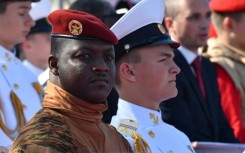 Captain Ibrahim Traore, seen here attending a parade during a visit to Russia in July, became the world's youngest leader when he was sworn in 2022 at the age of 34