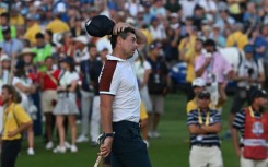 Rory McIlroy narrowly missed his effort to match Cantlay's birdie