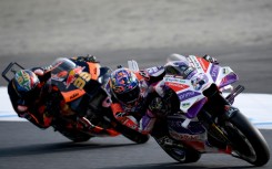 Prima Pramac Racing rider Jorge Martin of Spain (R) wins the sprint race of MotoGP Japanese Grand Prix in Motegi