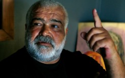 Khaled Khalifa speaks during an interview with AFP at his home in the Syrian capital Damascus in 2020