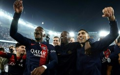 PSG's Ousmane Dembele (C) and Achraf Hakimi (R) celebrate after a 4-0 win over Marseille at the Parc des Princes on September 24, 2023