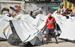 People displaced by the latest gang violence take refuge in the Vincent gymnasium converted into a shelter in Port-au-Prince, Haiti on August 30, 2023