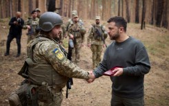 Ukrainian President Volodymyr Zelensky said on Tuesday he was visiting troops near the eastern front line