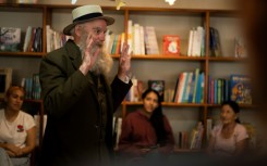 While on a week-long cruise vacation with his wife, Noll gave a talk to other passengers on the vessel in his Darwin garb, visited a school and the Charles Darwin Research Center where he did a presentation