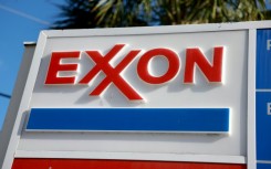 Shares of ExxonMobil retreated following reports it is nearing a potential deal to acquire Pioneer Natural Resources that could be worth $60 billion