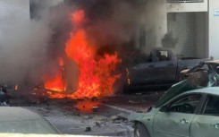 Car on fire after rocket strike in Israel's Ashkelon