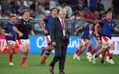 Wales coach Warren Gatland leads warm up prior to the pool match between Wales and Fiji