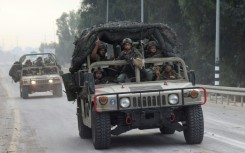 The Israeli army has called up 300,000 reservists for its "Swords of Iron" campaign and massed tanks and other heavy armour near Gaza