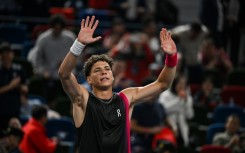 Ben Shelton celebrates his win against Italy's Jannik Sinner at the Shanghai Masters 