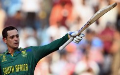 Man of the moment: South Africa's Quinton de Kock celebrates his century against Australia