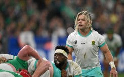 Siya Kolisi (C) may be the Springbok general on the field but he is backed up by a team of decision-makers including scrum-half Faf de Klerk (R)