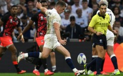 Owen Farrell's late drop goal help England beat Fiji to qualify for the Rugby World Cup semi-finals