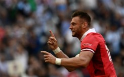Dan Biggar celebrates scoring a try against Argentina but Wales exited the World Cup after a 29-17 defeat
