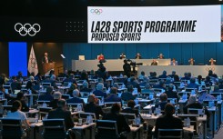 A digital display shows the new sports proposed to feature at the 2028 Olympic Games in Los Angeles