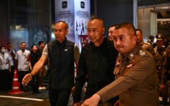 Newly appointed police chief Torsak Sukvimol (C) said relaxing the haircut rules was a step towards modernising the force