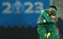 Team spirit: South Africa captain Temba Bavuma (right) celebrates victory over Australia with Keshav Maharaj in Lucknow last week