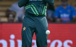 Down and out: Pakistan's Usama Mir drops a catch off Australia's David Warner 