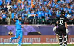 'Like a Ferrari': India's Mohammed Shami celebrates after taking the wicket of New Zealand's Will Young at Dharamsala on Sunday 