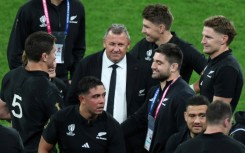 New Zealand head coach Ian Foster celebrates with his players after reaching the Rugby World Cup final