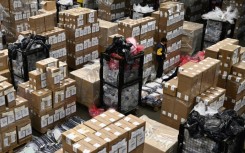Ballot boxes stand ready inside a warehouse ahead of the vote