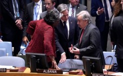 US Secretary of State Antony Blinken speaks with UN Secretary-General Antonio Guterres and US Ambassador to the UN Linda Thomas-Greenfield before the start of a United Nations Security Council meeting on the conflict in Middle East