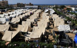Tents for Palestinians seeking refuge are set up on the grounds of a UN Relief and Works Agency for Palestine Refugees centre in Khan Yunis in the southern Gaza Strip on October 19, 2023