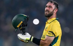 Record breaker: Australia's Glenn Maxwell celebrates after scoring a 40-ball century on Wednesday