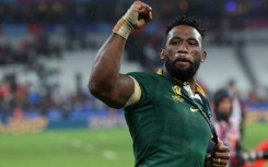 South Africa captain Siya Kolisi celebrates his side's victory in the Rugby World Cup final over New Zealand