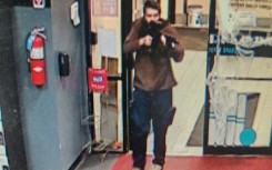 This handout image released on October 25, 2023 by the Androscoggin County Sheriff's Office via Facebook shows the armed suspect in a shooting in Lewiston, Maine