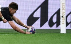 Beauden Barrett scores a try in the corner for New Zealand