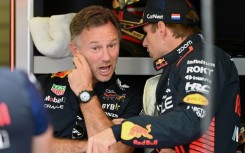 Red Bull Racing's Dutch driver Max Verstappen  speaks with team principal Christian Horner during the first practice session for the Formula One Mexico Grand Prix on Friday.