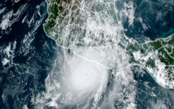An image from the US National Oceanic and Atmospheric Administration shows Hurricane Otis approaching Mexico's southern Pacific coast