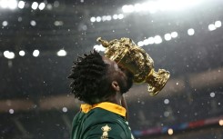 South Africa captain Siya Kolisi kisses the Webb Ellis Cup after victory over New Zealand in the 2023 Rugby World Cup final in Paris.