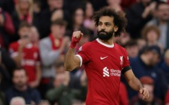 Liverpool star Mohamed Salah celebrates his Premier League goal against Nottingham Forest at Anfield
