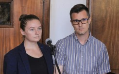 Nicholas and Mackenzie Spencer were arrested last year and initially charged with "aggravated trafficking" and committing "aggravated torture"