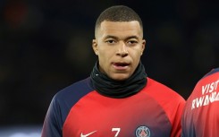 Kylian Mbappe warming up ahead of Paris Saint-Germain's clash with Montpellier on Friday