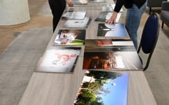 Pictures being prepared for an international photo exhibition in Budapest on homelessness in Central European countries