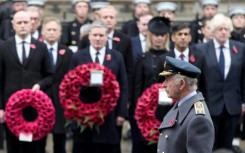 The king laid a wreath on the Cenotaph shortly after the nation fell silent at 11:00 am to honour its war dead